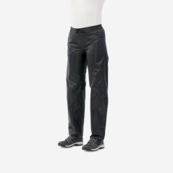 Spodnie wierzchnie turystyczne damskie Quechua Raincut wodoodporne. Czarne spodnie sportowe damskie QUECHUA, bez wzorów, z materiału, sportowe, trekkingowe. Za 69.99 zł.