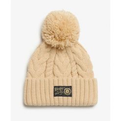 Gruba czapka w warkoczowym splocie damska Superdry. Brązowe czapki damskie Superdry, na zimę, bez wzorów, z dzianiny. Za 129.60 zł.