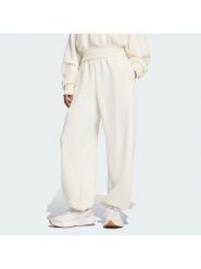Adidas Spodnie dresowe Soft Lux JV9896 Kremowy Regular Fit. Białe spodnie dresowe damskie Adidas, bez wzorów, z dresówki. Za 329.99 zł.