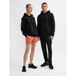 Hoodie Hummel hmlLEGACY. Czarne bluzy damskie Hummel, m, bez wzorów, z bawełny, sportowe, bez ramiączek, z kapturem. Za 167.50 zł.