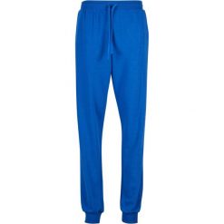 Spodnie dresowe dla kobiet Urban Classics Light Terry. Niebieskie spodnie dresowe damskie Urban Classics, bez wzorów, z dresówki, sportowe, długie. Za 183.50 zł.