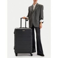 Walizka duża GINO ROSSI. Czarne walizki damskie Gino Rossi, bez wzorów, duże. Za 299.99 zł.