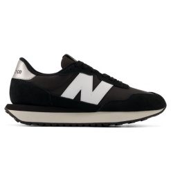 Buty damskie New Balance W23731P – czarne. Czarne obuwie sportowe damskie New Balance, bez wzorów, z gumy, bez zapięcia. Za 299.99 zł.