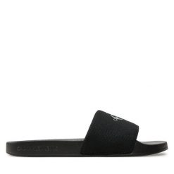 Klapki Calvin Klein Jeans. Czarne klapki damskie Calvin Klein Jeans, bez wzorów, z jeansu, bez obcasa, bez zapięcia. Za 179.99 zł.
