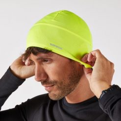 Czapka do biegania Kiprun Warm+ ocieplana V2. Zielone czapki damskie KIPRUN, bez wzorów, z elastanu, sportowe. Za 39.99 zł.