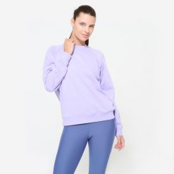 Bluza damska Domyos Gym & Pilates. Żółte bluzy damskie DOMYOS, l, bez wzorów, z materiału, sportowe, bez ramiączek, bez kaptura. W wyprzedaży za 49.99 zł.