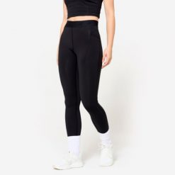 Legginsy fitness damskie Domyos. Fioletowe legginsy damskie DOMYOS, bez wzorów, z elastanu. W wyprzedaży za 69.99 zł.