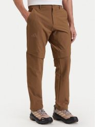 Adidas Spodnie outdoor KW7459 Brązowy Regular Fit. Brązowe spodnie sportowe męskie Adidas, m, bez wzorów, z syntetyku, outdoorowe. Za 349.99 zł.