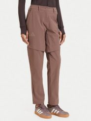 Adidas Spodnie outdoor Terrex Multi KW7469 Brązowy jasny Regular Fit. Brązowe spodnie sportowe damskie Adidas, bez wzorów, z syntetyku, sportowe, outdoorowe. Za 349.99 zł.