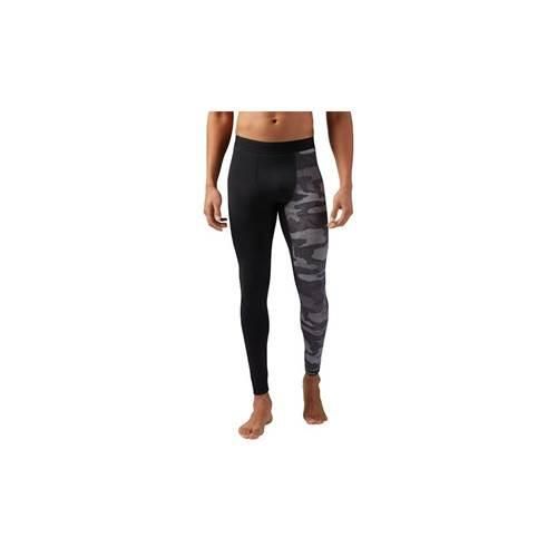 Spodnie sportowe damskie Reebok Compression Tight. Czarne spodnie dresowe damskie Reebok, bez wzorów, sportowe, długie. Za 267.00 zł.