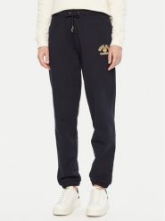 Guess Jeans Spodnie dresowe W5RB63 K68I4 Granatowy Regular Fit. Niebieskie spodnie dresowe damskie Guess Jeans, z aplikacjami, z bawełny. Za 197.99 zł.