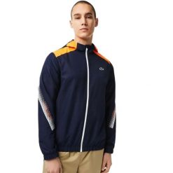 Kurtka sportowa męska Lacoste. Niebieskie kurtki sportowe męskie Lacoste, m, bez wzorów, z kapturem, tenisowe. Za 417.00 zł.