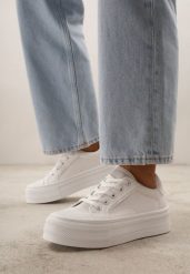 Białe Klasyczne Trampki na Grubej Podeszwie Araenes. Białe trampki i tenisówki damskie Born2be, bez wzorów, z jeansu, bez zapięcia. Za 79.99 zł.