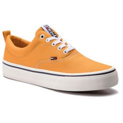 Tenisówki TOMMY JEANS - Classic Tommy Jeans Sneaker EM0EM00259 Radiant Yellow 726. Żółte trampki męskie Tommy Jeans, bez wzorów, z gumy, eleganckie, bez zapięcia. W wyprzedaży za 179.00 zł.