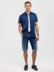 Szorty męskie jeansowe z przetarciami granatowe Conner 407. Niebieskie szorty męskie BIG STAR, bez wzorów, z denimu, klasyczne. W wyprzedaży za 179.99 zł.
