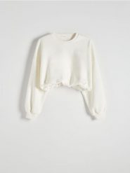 Krótka bluza - złamana biel. Bluzy damskie Reserved, l, bez wzorów, z bawełny, bez ramiączek, bez kaptura. W wyprzedaży za 69.99 zł.