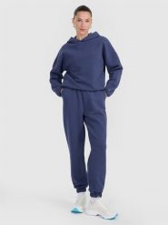 4F Spodnie dresowe z waflowej dzianiny damskie - granatowe XS. Niebieskie spodnie dresowe damskie 4F, bez wzorów, z dresówki. Za 169.99 zł.