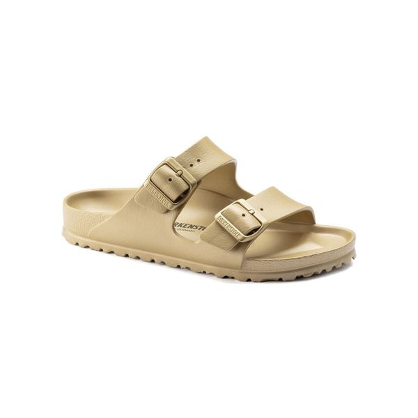Klapki damskie Birkenstock Arizona Eva. Żółte klapki damskie Birkenstock, na lato, bez wzorów, z materiału, bez obcasa, bez zapięcia. Za 335.00 zł.