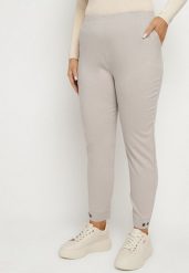 Beżowe Spodnie z Wiskozą z Gumką w Talii i Aplikacjami przy Nogawkach Stellorie. Brązowe spodnie materiałowe damskie Born2be, z aplikacjami, z jeansu, eleganckie, plus size. Za 64.99 zł.
