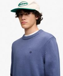 Superdry Sweter Preppy z bawełny – relaxed fit. Niebieskie swetry męskie Superdry, s, z aplikacjami, z bawełny, klasyczne, bez kołnierzyka, bez ramiączek. Za 379.95 zł.