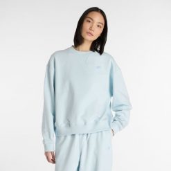 Bluza damska New Balance WT41500FRL – niebieska. Niebieskie bluzy damskie New Balance, m, bez wzorów, z bawełny, klasyczne, bez ramiączek, bez kaptura. Za 359.99 zł.