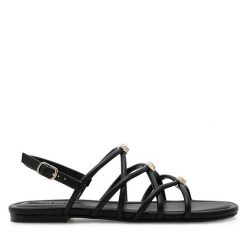 Sandały Nine West. Czarne sandały damskie Nine West, bez wzorów, bez obcasa, na płaskiej podeszwie, bez zapięcia. Za 119.99 zł.