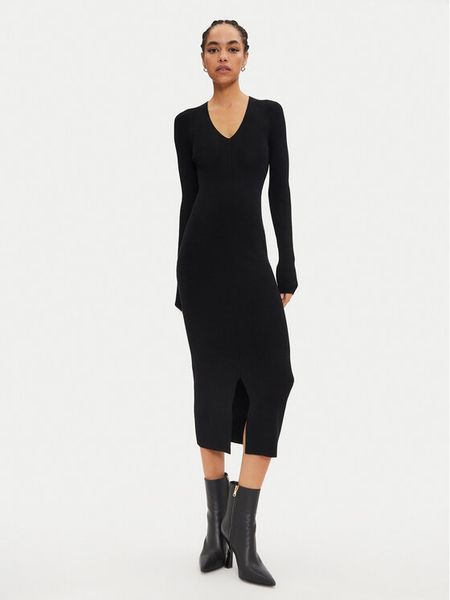 Calvin Klein Sukienka dzianinowa K20K207491 Czarny Slim Fit. Czarne sukienki damskie Calvin Klein, m, bez wzorów, z dzianiny, bez kołnierzyka, bez ramiączek. Za 659.99 zł.