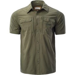 Męska treningowa koszula z krótkim rękawem militarna Magnum Battle. Zielone koszule męskie MAGNUM, m, bez wzorów, militarne, bez kołnierzyka, bez ramiączek. Za 190.45 zł.