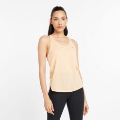 Koszulka damska New Balance WT41250PRE – pomarańczowa. Brązowe bluzki damskie New Balance, xl, bez wzorów, z materiału, sportowe, bez kołnierzyka, bez ramiączek. Za 69.99 zł.