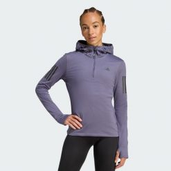 Bluza Own The Run Winterized Hooded Half-Zip. Fioletowe bluzy damskie Adidas, m, bez wzorów, bez ramiączek, z kapturem. Za 227.99 zł.