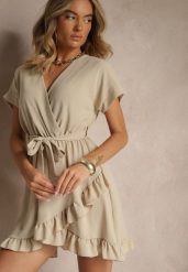 Beżowa Sukienka o Rozkloszowanym Kroju z Paskiem i Falbanami Addea. Brązowe sukienki damskie Renee, bez wzorów, eleganckie, bez kołnierzyka, bez ramiączek, mini, rozkloszowane. Za 54.99 zł.