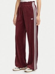 Adidas Spodnie dresowe Velour LG4291 Bordowy Loose Fit. Czerwone spodnie dresowe damskie Adidas, bez wzorów, z bawełny. Za 299.99 zł.