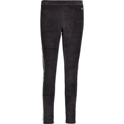Legginsy w kolorze czarnym. Czarne legginsy damskie Champion, bez wzorów. W wyprzedaży za 99.95 zł.