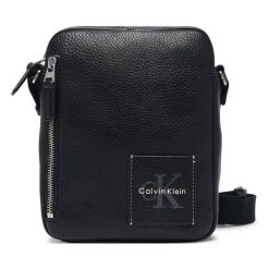Saszetka Calvin Klein. Czarne saszetki i nerki męskie Calvin Klein, bez wzorów. Za 369.99 zł.