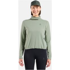 Bluza bez kaptura Odlo Mid Layer ESSENTIAL THERMAL. Zielone bluzy damskie ODLO, bez wzorów, bez ramiączek, bez kaptura. Za 319.99 zł.