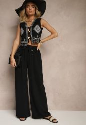 Czarne Spodnie z Bawełną o Szerokim Kroju High Waist Ozdobione Guzikami Morritia. Czarne spodnie materiałowe damskie Renee, bez wzorów, z bawełny, eleganckie, z podwyższonym stanem. Za 39.99 zł.