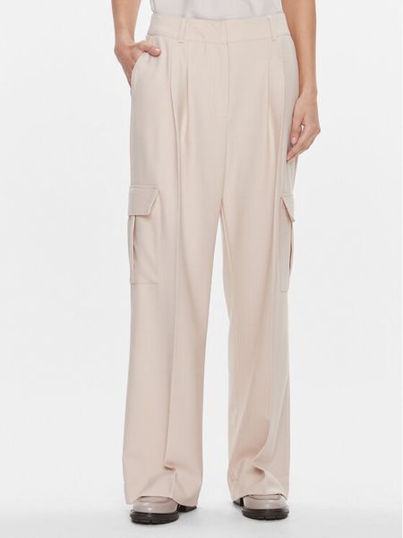 Herskind Spodnie materiałowe Louise 5011993 Beżowy Relaxed Fit. Brązowe spodnie materiałowe damskie Herskind, bez wzorów, z materiału. Za 1,019.00 zł.