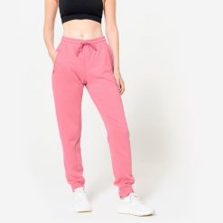 Spodnie dresowe damskie Domyos Gym & Pilates. Czerwone spodnie dresowe damskie DOMYOS, bez wzorów, z dresówki, eleganckie. Za 109.99 zł.