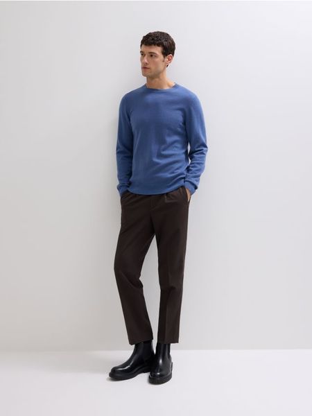 Sweter z wełny merino - granatowy. Niebieskie swetry męskie Reserved, l, bez wzorów, z wełny, bez kołnierzyka, bez ramiączek. Za 199.99 zł.