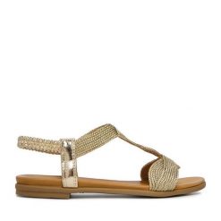 Sandały JENNY. Żółte sandały damskie Jenny, bez wzorów, bez obcasa, na płaskiej podeszwie, bez zapięcia. Za 89.99 zł.