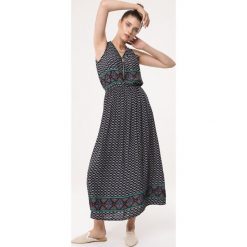 Granatowa Sukienka Succour. Niebieskie sukienki damskie Born2be, na lato, l, bez wzorów, z materiału, bez kołnierzyka, bez ramiączek, maxi. Za 34.99 zł.