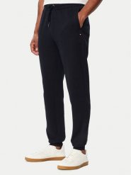 Tommy Hilfiger Spodnie dresowe Essential MW0MW44990 Granatowy Regular Fit. Niebieskie spodnie sportowe męskie Tommy Hilfiger, m, bez wzorów, z bawełny. Za 529.99 zł.