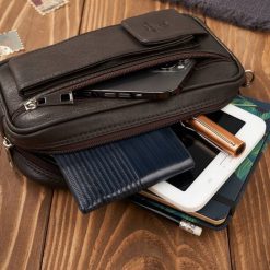 Paolo Peruzzi Saszetka męska skórzana do ręki z miejscem na telefon brązowa T-132-BR. Brązowe saszetki i nerki męskie Paolo Peruzzi, do ręki. Za 178.31 zł.