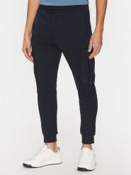 BOSS Spodnie dresowe Seteam 50542917 Granatowy Regular Fit. Niebieskie spodnie sportowe męskie Boss, m, bez wzorów, z bawełny. Za 329.99 zł.