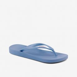 Damskie klapki Coqui. Niebieskie klapki damskie Coqui, bez wzorów, z materiału, bez obcasa, bez zapięcia. Za 129.99 zł.