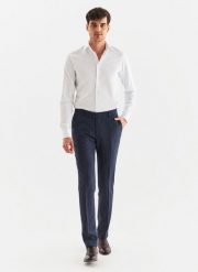 PAKO LORENTE – Granatowe spodnie garniturowe w kratę. Niebieskie eleganckie spodnie męskie Pako Lorente, bez wzorów, z wełny. Za 349.99 zł.