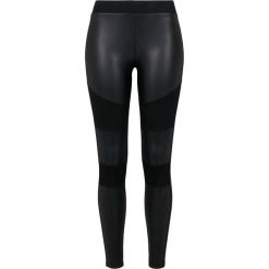 Legginsy miejskie klasyczne sztuczna skóra. Czarne legginsy damskie Urban Classics, bez wzorów, z dżerseju. Za 127.50 zł.