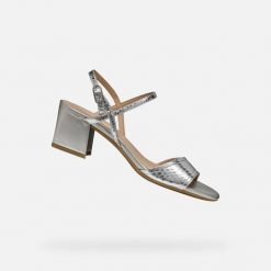 Sandały GEOX D NEW ERAKLIA 50 Srebrny. Szare sandały damskie Geox, bez wzorów, ze skóry, bez obcasa, bez zapięcia. Za 434.99 zł.