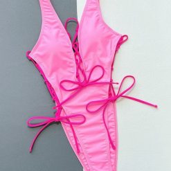 Strój kąpielowy jednoczęściowy z sznurowaniem na plażę Angelien. Czerwone stroje kąpielowe damskie Intica, l, bez wzorów, z materiału. Za 149.00 zł.