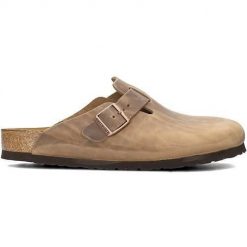 Klapki męskie Birkenstock Boston. Brązowe klapki męskie Birkenstock, bez wzorów, z materiału, bez zapięcia. Za 567.65 zł.